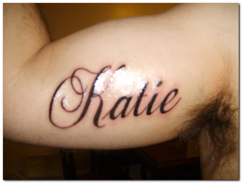 Katie Name Tattoo On Right Bicep
