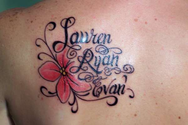 Lauren Ryan Evan Name With Flower Tattoo On Left Back Shoulder