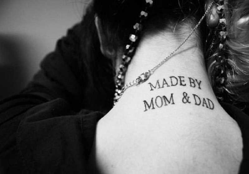 Made By Mom & Dad Quote Tattoo On Girl Back Neck