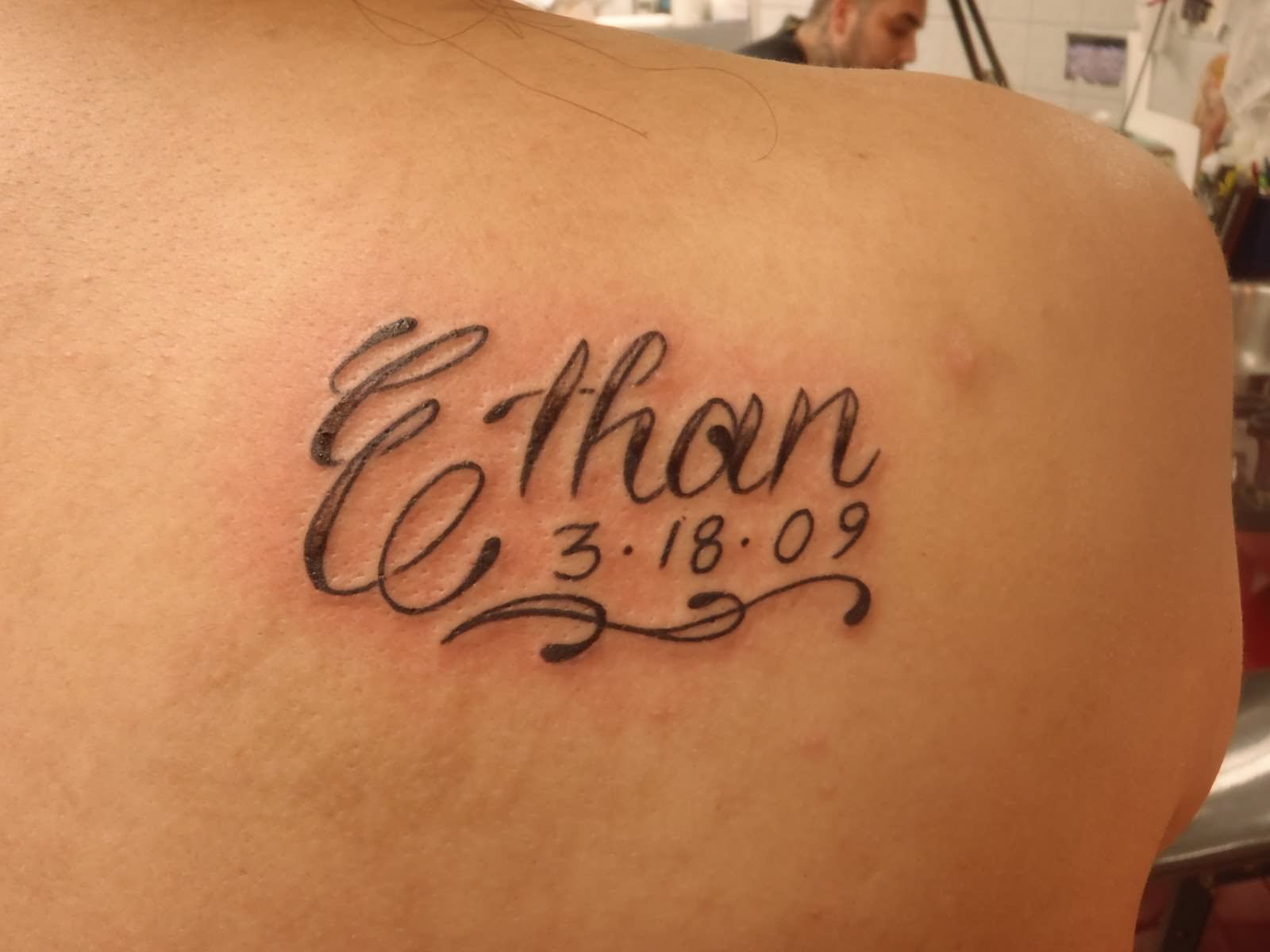 Memorial Ethan Name Tattoo On Right Back Shoulder