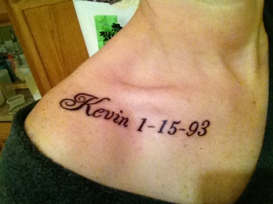 Memorial Kevin Name Tattoo On Right Upper Shoulder
