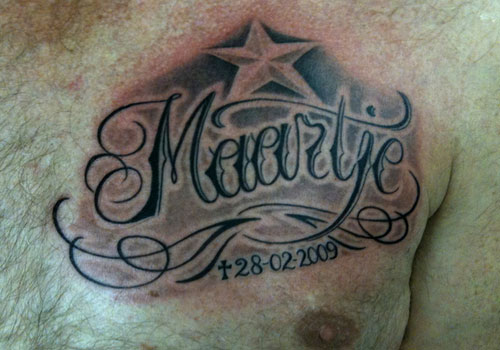 Memorial Maartje Name Tattoo On Man Chest