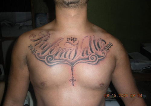 Memorial Rufina Valles Name Tattoo On Man Chest