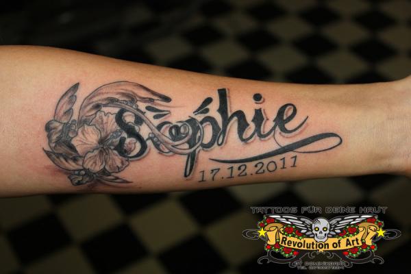 Memorial Sophie Name With Flowers Tattoo On Left Forearm By Dominik