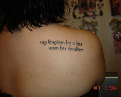 My Kingdom For A Kiss Upon Her Shoulder Words Tattoo On Right Back Shoulder