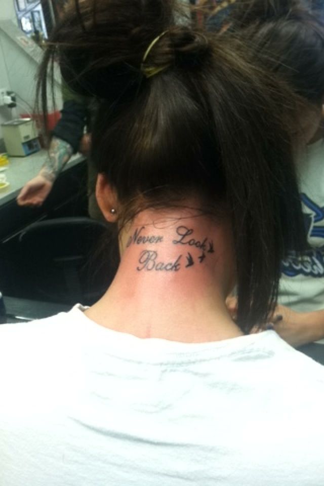 Never Looks Back Quote With Flying Birds Tattoo On Girl Back Neck