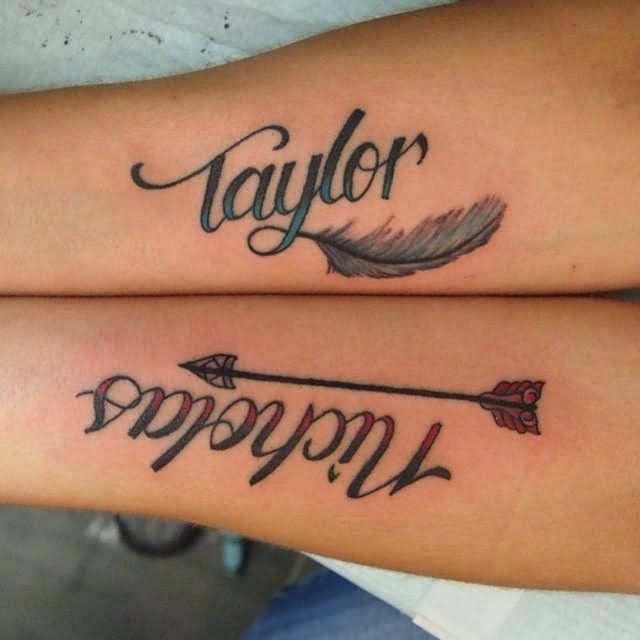 Nicholas And Taylor Name With Feather And Arrow Tattoo On Both Forearm