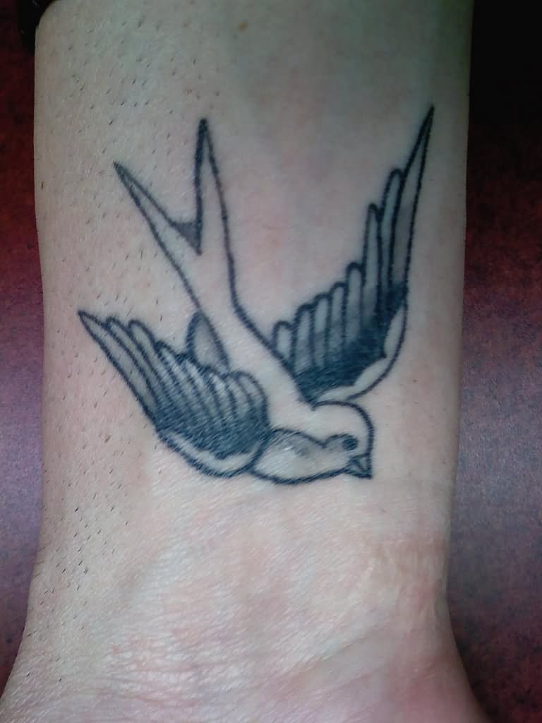 Outline Sparrow Tattoo On Wrist