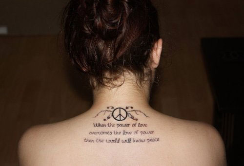Peace Symbol With Quote Tattoo On Girl Back Neck