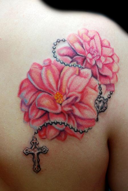 Pink Ink Dahlia Flowers With Rosary Cross Tattoo On Right Back Shoulder