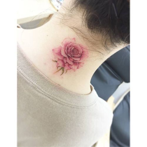 Pink Ink Rose Tattoo On Back Neck