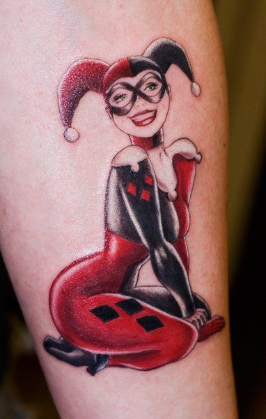 Red And Black Ink Harley Quinn Tattoo On Arm