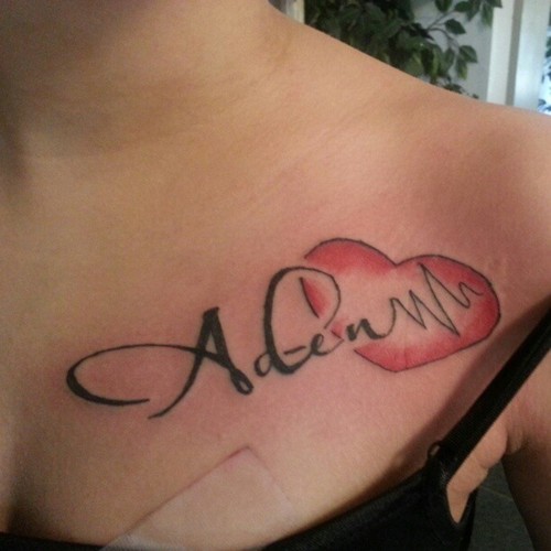 Red Heart With Aden Name Tattoo On Girl Chest