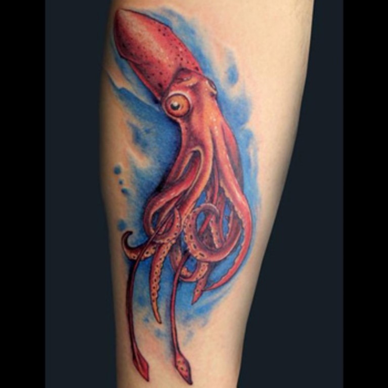 Red Ink Squid Tattoo On Leg