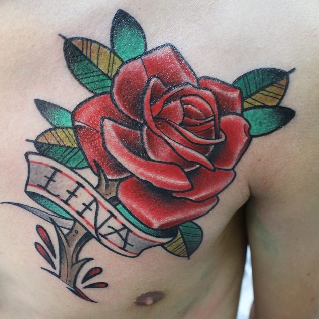 Red Rose With Lina Name Banner Tattoo On Man Left Chest