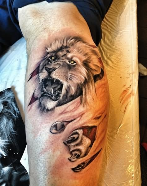 Ripped Skin Lion Tattoo On Side Leg Calf