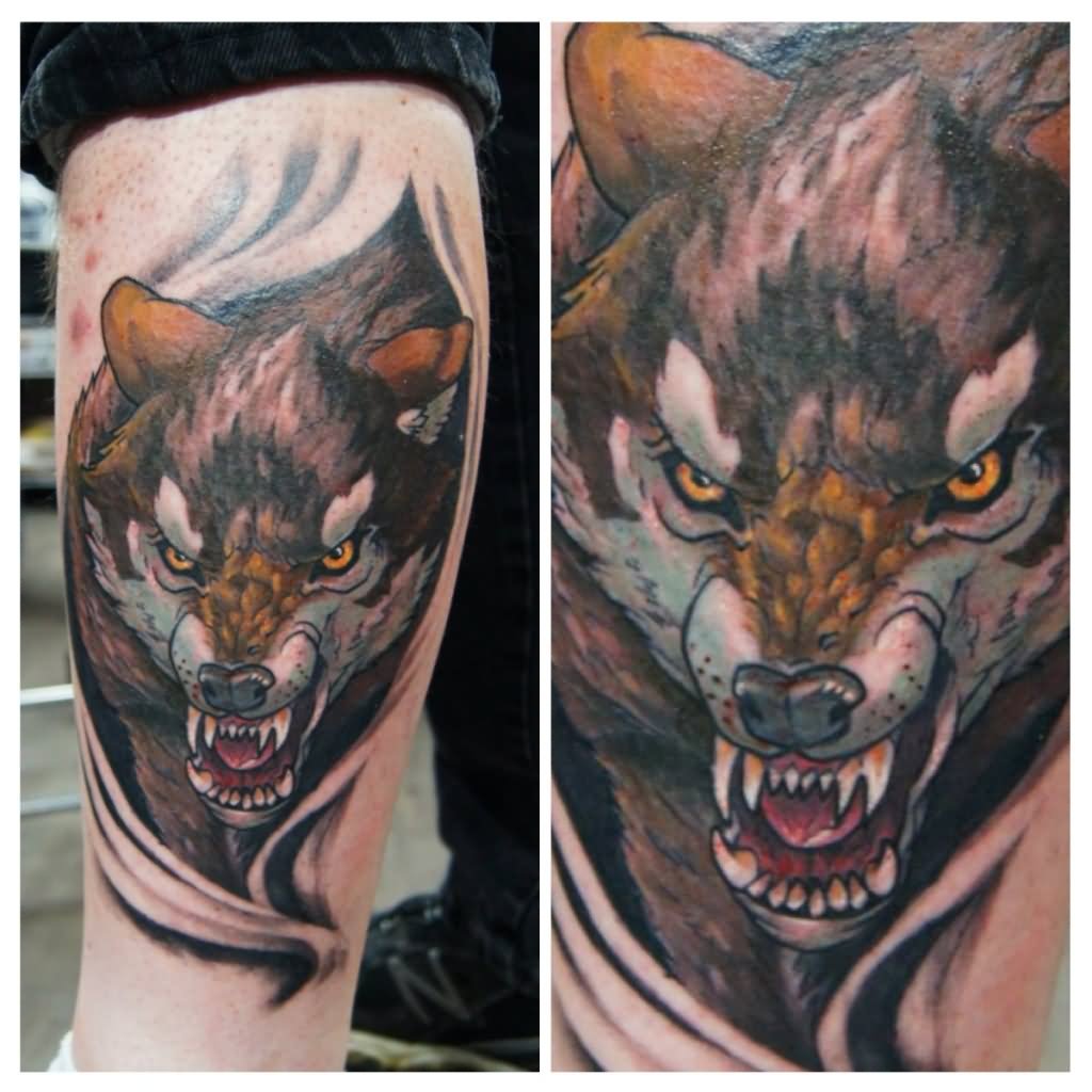 Ripped Skin Wolf Head Tattoo Design For Leg Calf.