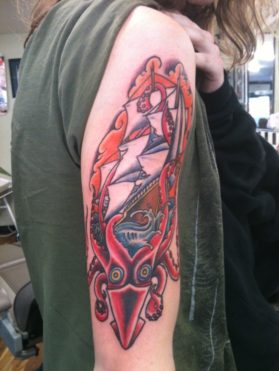 Ship Vs Squid Traditional Tattoo On Half Sleeve