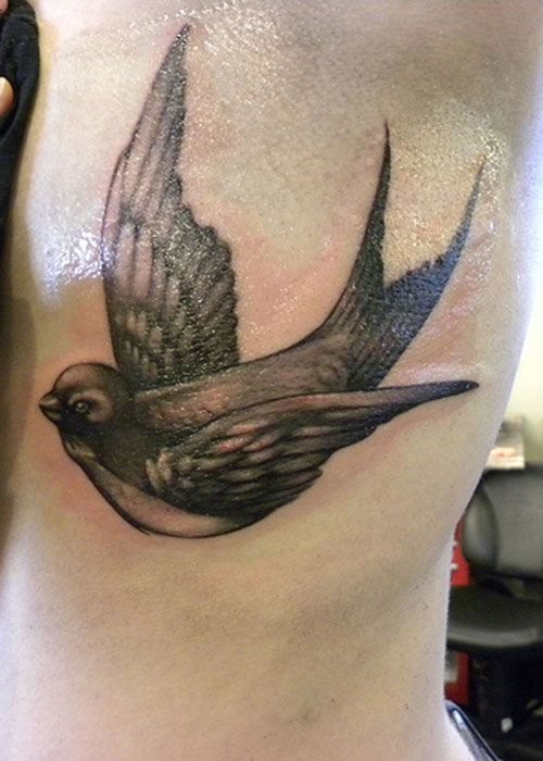 Side Rib Grey Ink Sparrow Tattoo