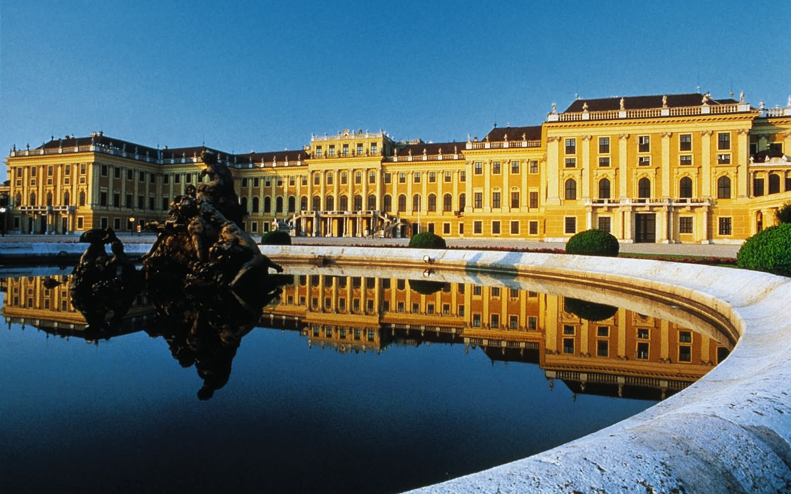 Side View Of The Schonbrunn Palace From The Fountain