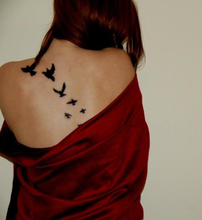 Silhouette Flying Birds Tattoo On Women Upper Back