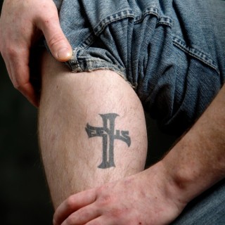 Simple Black Cross Tattoo On Leg Calf