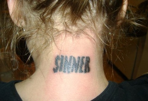 Sinner Lettering Tattoo On Girl Back Neck