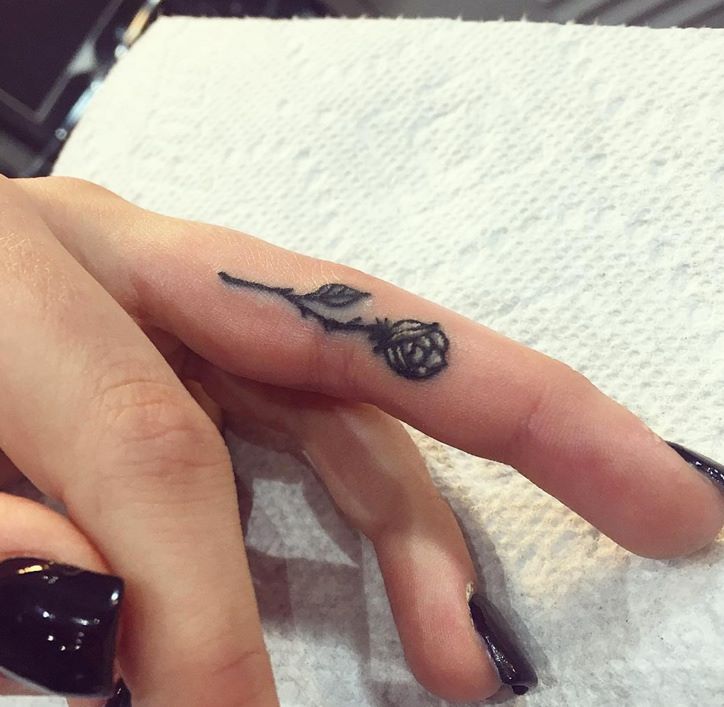 Small Grey Rose Tattoo On Finger