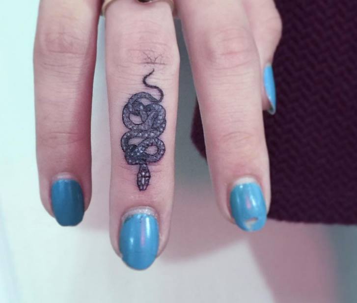 Small Snake Tattoo On Finger