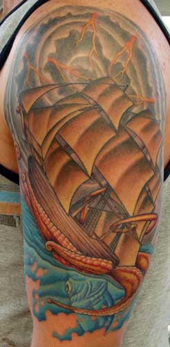 Squid Vs Ship Tattoo On Left Arm