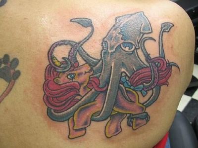 Squid With Little Pony Tattoo On Right Back shoulder
