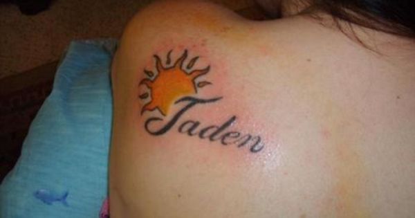 Sun With Taden Name Tattoo On Left Back Shoulder