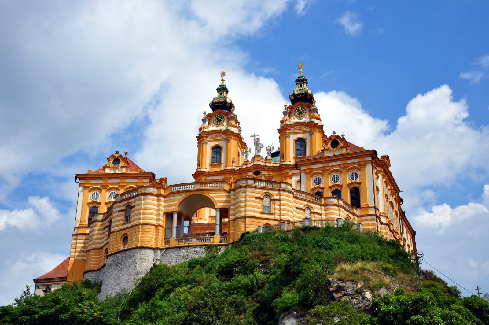 The Melk Abbey On A Rocky Outcrop In Austria