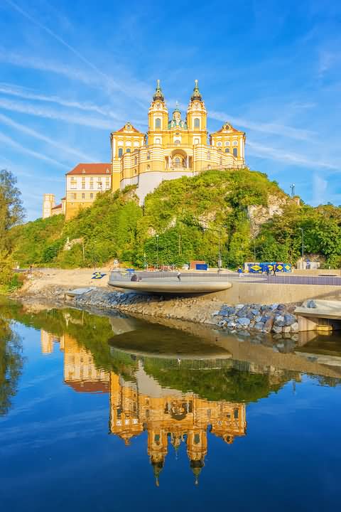 The Melk Abbey Water Reflection In Danube River In Austria