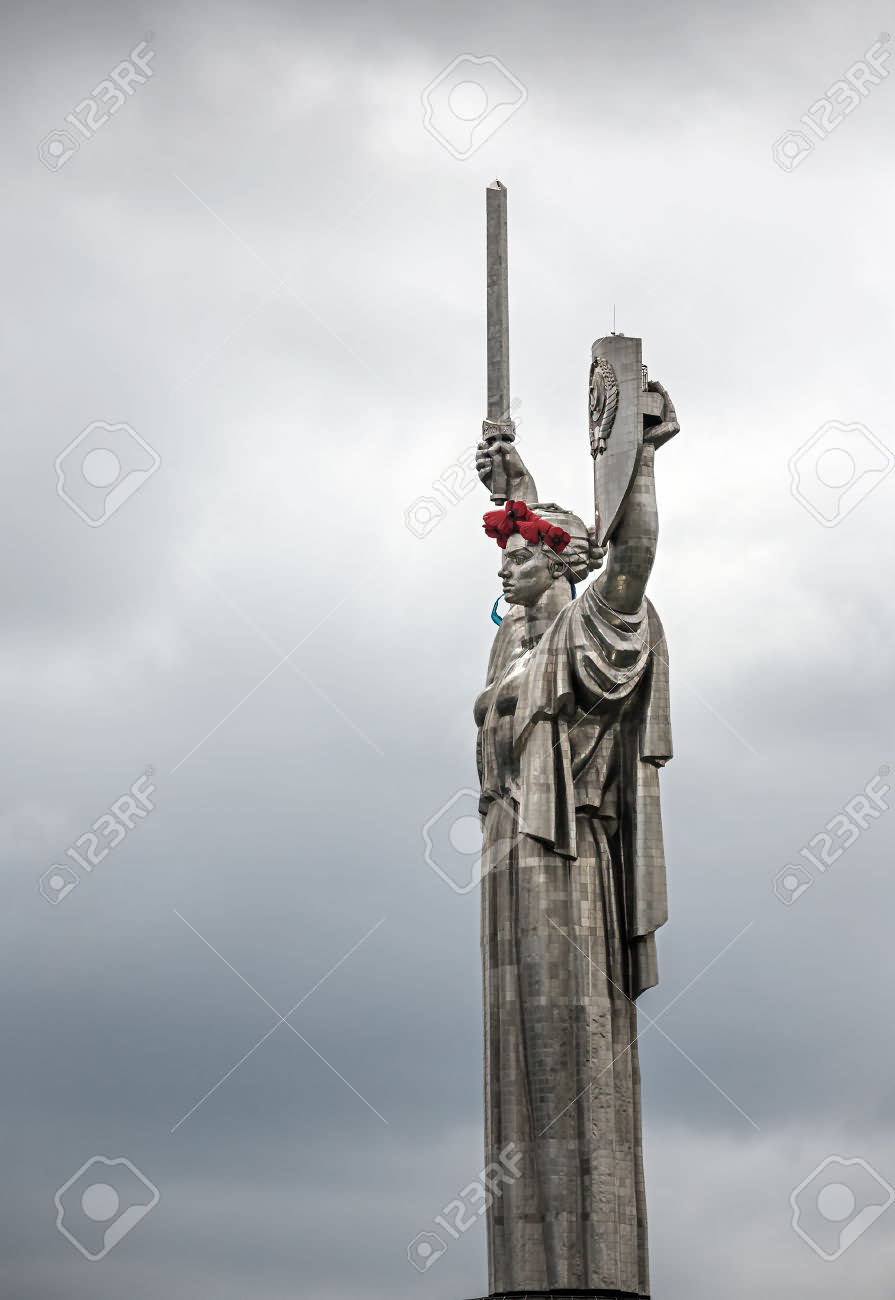 The Mother Motherland Statue With Red Poppies On Head In Kiev, Ukraine