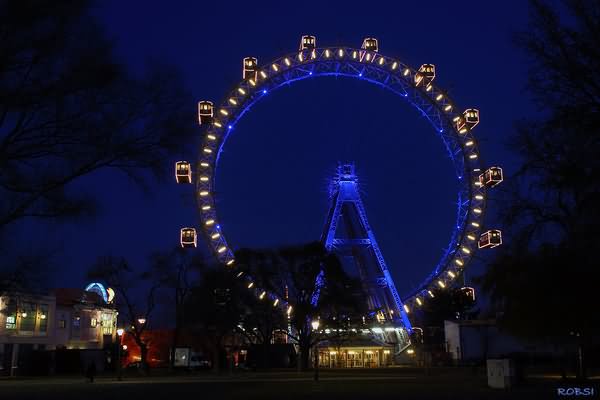 The Wiener Riesenrad Ferris Wheel Lit Up During Night