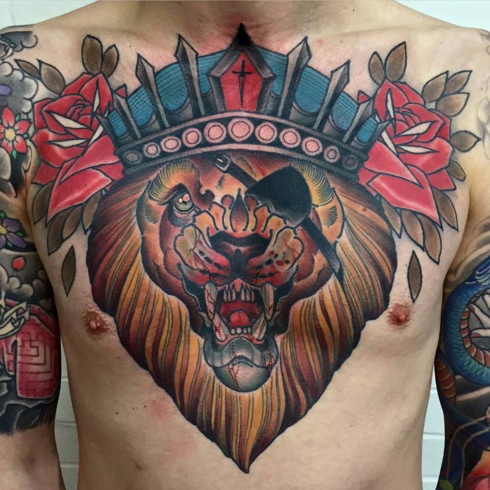 Traditional Pirate Lion Head Tattoo On Chest by Best UK Tattoo Artist