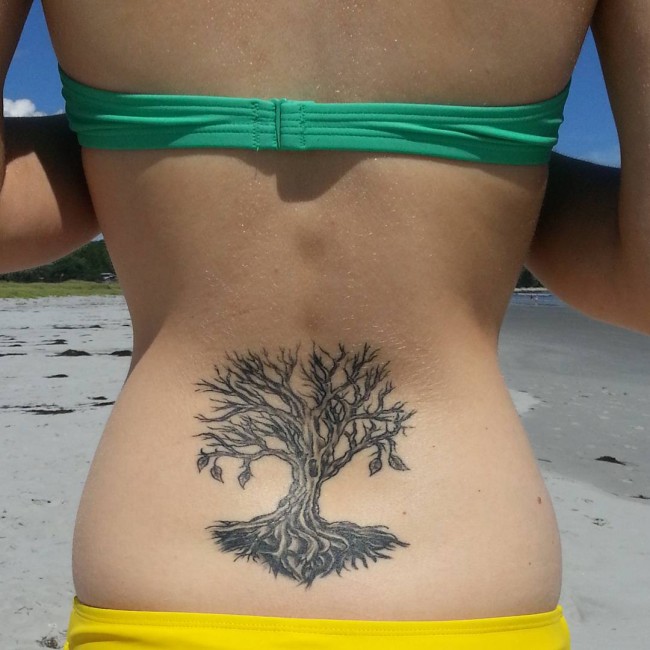 Tree Without Leaves Tattoo On Girl Lower Back