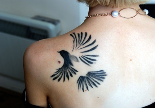 Unique Black Flying Bird Tattoo On Women Left Back Shoulder