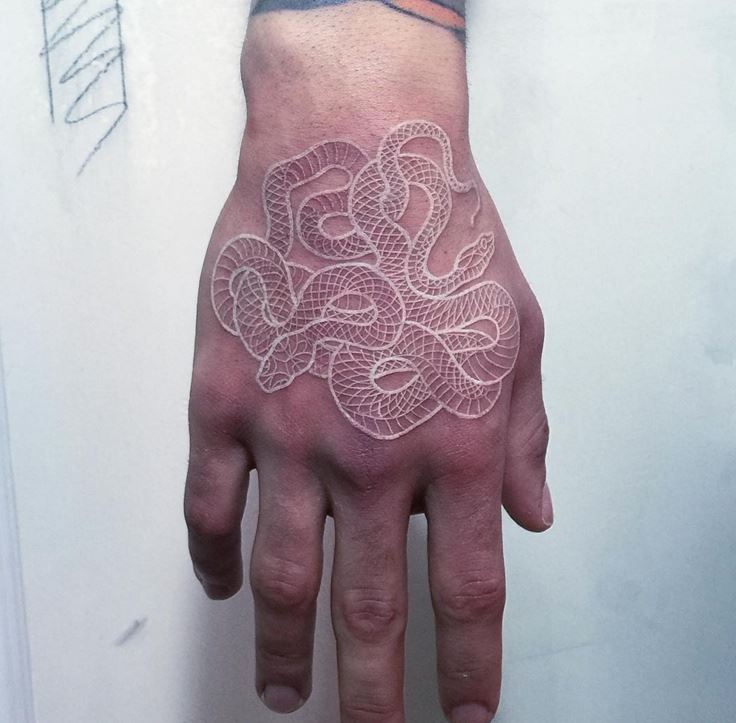 White Ink Snake Tattoo On Right Hand