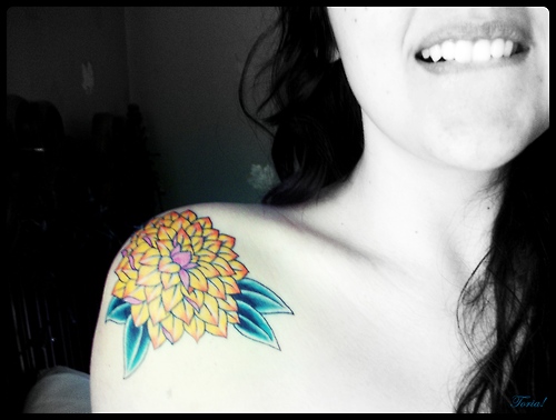 Yellow Dahlia Flower Tattoo On Right Front Shoulder