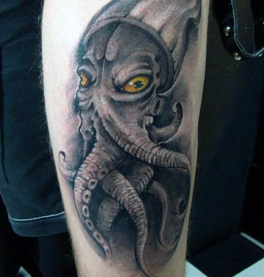 Yellow Eyes Grey Ink Squid Tattoo