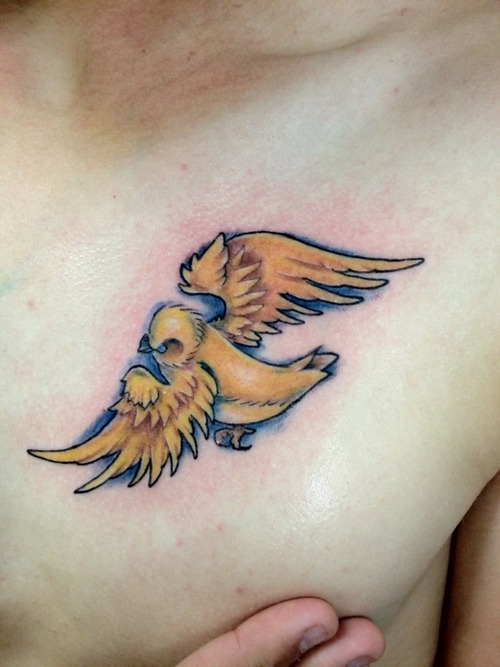 Yellow Ink Sparrow Tattoo On Chest