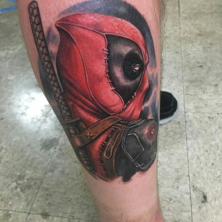3D Deadpool Face Tattoo On Right Leg Calf