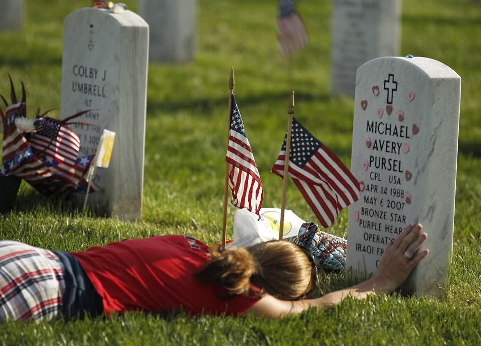 A Mourner Woman At Grave On Memorial Day
