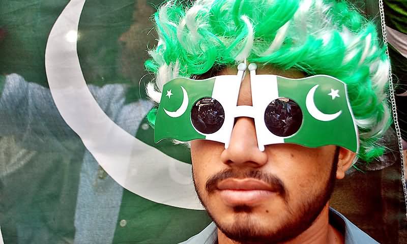 A Pakistani Youngster Wearing Cap And Glasses To Celebrate The Independence Day Of Pakistan