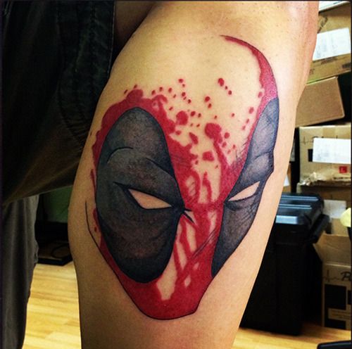 Abstract Deadpool Head Tattoo On Right Side Leg Calf