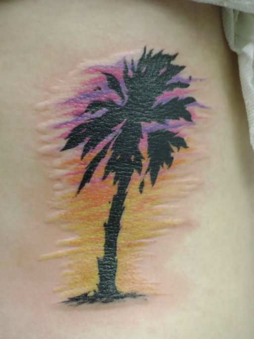 Amazing Palm Tree Tattoo On Side Rib
