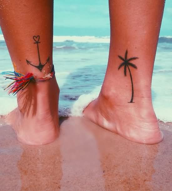 Anchor And Palm Tree Tattoos On Back Legs