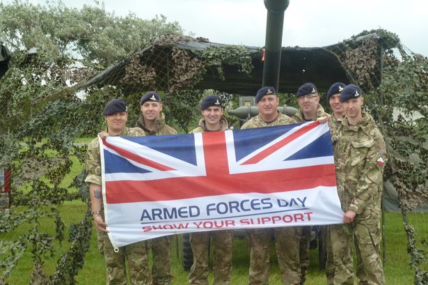 Army Men With Armed Forces Day Flag Picture